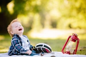 A Grand Rapids lifestyle camping theme family session for a one year old.