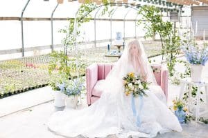 This Greenhouse wedding was photographed in Grand Rapids, MI. The inspiration includes a french bulldog, beautiful blooms, and endless wedding photo inspiration.