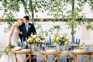 This Greenhouse wedding was photographed in Grand Rapids, MI. The inspiration includes a french bulldog, beautiful blooms, and endless wedding photo inspiration.