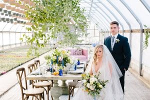 This Greenhouse wedding was photographed in Grand Rapids, MI. The inspiration includes a french bulldog, beautiful blooms, and endless wedding photo inspiration.