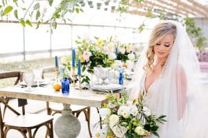 This Greenhouse wedding was photographed in Grand Rapids, MI. The inspiration includes a french bulldog, beautiful blooms, and endless wedding photo inspiration.