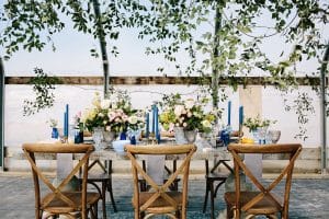 This Greenhouse wedding was photographed in Grand Rapids, MI. The inspiration includes a french bulldog, beautiful blooms, and endless wedding photo inspiration.