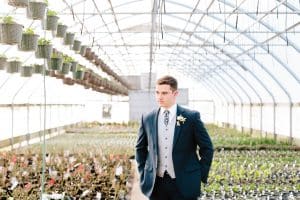 This Greenhouse wedding was photographed in Grand Rapids, MI. The inspiration includes a french bulldog, beautiful blooms, and endless wedding photo inspiration.