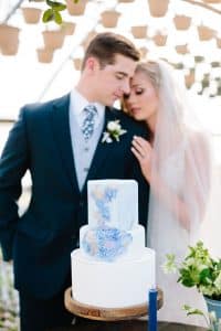 This Greenhouse wedding was photographed in Grand Rapids, MI. The inspiration includes a french bulldog, beautiful blooms, and endless wedding photo inspiration.