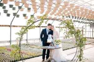 This Greenhouse wedding was photographed in Grand Rapids, MI. The inspiration includes a french bulldog, beautiful blooms, and endless wedding photo inspiration.