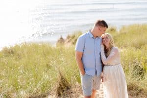 Holland Michigan maternity photos at Tunnel Park. Whitley wore a beautiful white lace gown.