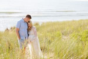 Holland Michigan maternity photos at Tunnel Park. Whitley wore a beautiful white lace gown.