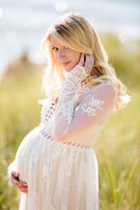 Holland Michigan maternity photos at Tunnel Park. Whitley wore a beautiful white lace gown.