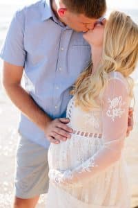 Holland Michigan maternity photos at Tunnel Park. Whitley wore a beautiful white lace gown.