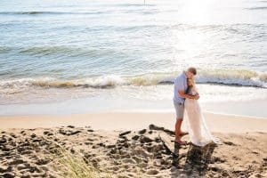 Holland Michigan maternity photos at Tunnel Park. Whitley wore a beautiful white lace gown.
