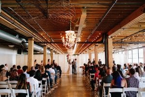 A unique industrial wedding with pineapple decor in downtown Grand Rapids at the Cheney Place.