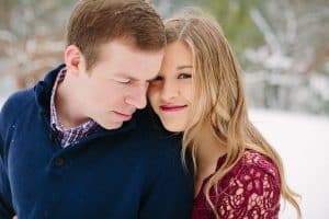 A winter engagement session in Grand Rapids, MI photographed by Mae Photo Co at Provin Trails, Aquinas college, and wealthy street bakery.