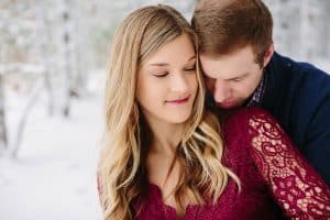 A winter engagement session in Grand Rapids, MI photographed by Mae Photo Co at Provin Trails, Aquinas college, and wealthy street bakery.