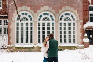 A winter engagement session in Grand Rapids, MI photographed by Mae Photo Co at Provin Trails, Aquinas college, and wealthy street bakery.