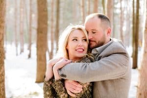 A winter woods engagement session at Provin Trails in Grand Rapids, Michigan. Photographed by Mae Photo Co.