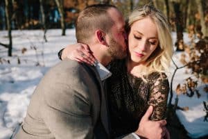 A winter woods engagement session at Provin Trails in Grand Rapids, Michigan. Photographed by Mae Photo Co.