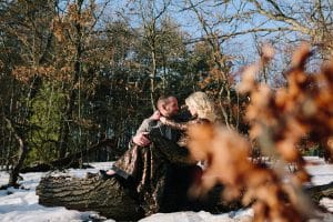 A winter woods engagement session at Provin Trails in Grand Rapids, Michigan. Photographed by Mae Photo Co.