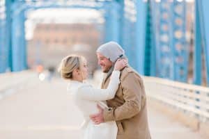 A blue bridge engagement session in Grand Rapids, Michigan. Photographed by Mae Photo Co.
