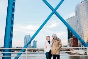 A blue bridge engagement session in Grand Rapids, Michigan. Photographed by Mae Photo Co.