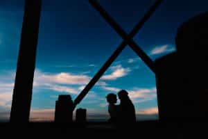 A blue bridge engagement session in Grand Rapids, Michigan. Photographed by Mae Photo Co.