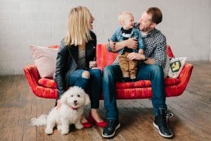 A family session with a dog and a baby photographed in Grand Rapids, Michigan.