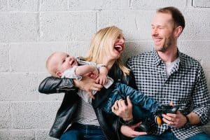 A family session with a dog and a baby photographed in Grand Rapids, Michigan.
