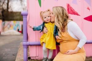 A colorful downtown Grand Rapids maternity session photographed by Mae Photo Co.