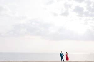 A Grand Haven Beach engagement session in Michigan photographed by Mae Photo Co.