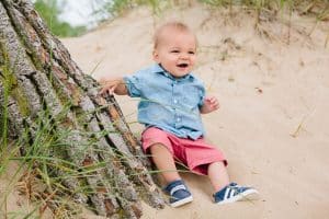 A holland state park beach family photo session by Mae Photo Co.