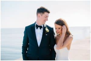 Bride and groom on the Grand Haven beach