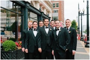All of the groomsmen line up to take a picture outside in Grand Rapids, Michigan.