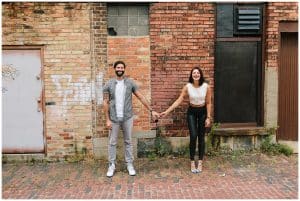 A downtown Grand Rapids Lifestyle Photo Shoot down a brick road alley.