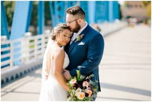 Wedding photos taken under the blue bridge in Grand Rapids Michigan.