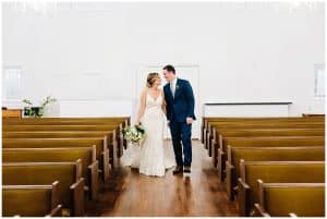 An intimate white chapel wedding in Holly, Michigan photographed by Mae Photo Co.