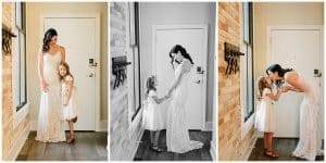 A black and white image of a bride sharing a private moment with her daughter before the wedding.