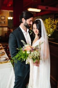 A styled wedding shoot at New Hotel Mertens in Grand Rapids, Michigan by Mae Photo Co.