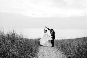 Bride and Groom sunset portraits on Lake Michigan photographed by Mae Photo Co.