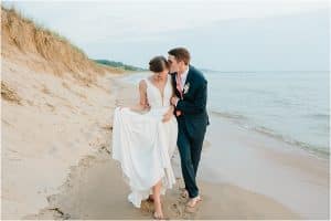 Bride and Groom sunset portraits on Lake Michigan photographed by Mae Photo Co.