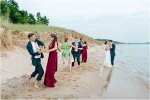 Bride and Groom sunset portraits on Lake Michigan photographed by Mae Photo Co.